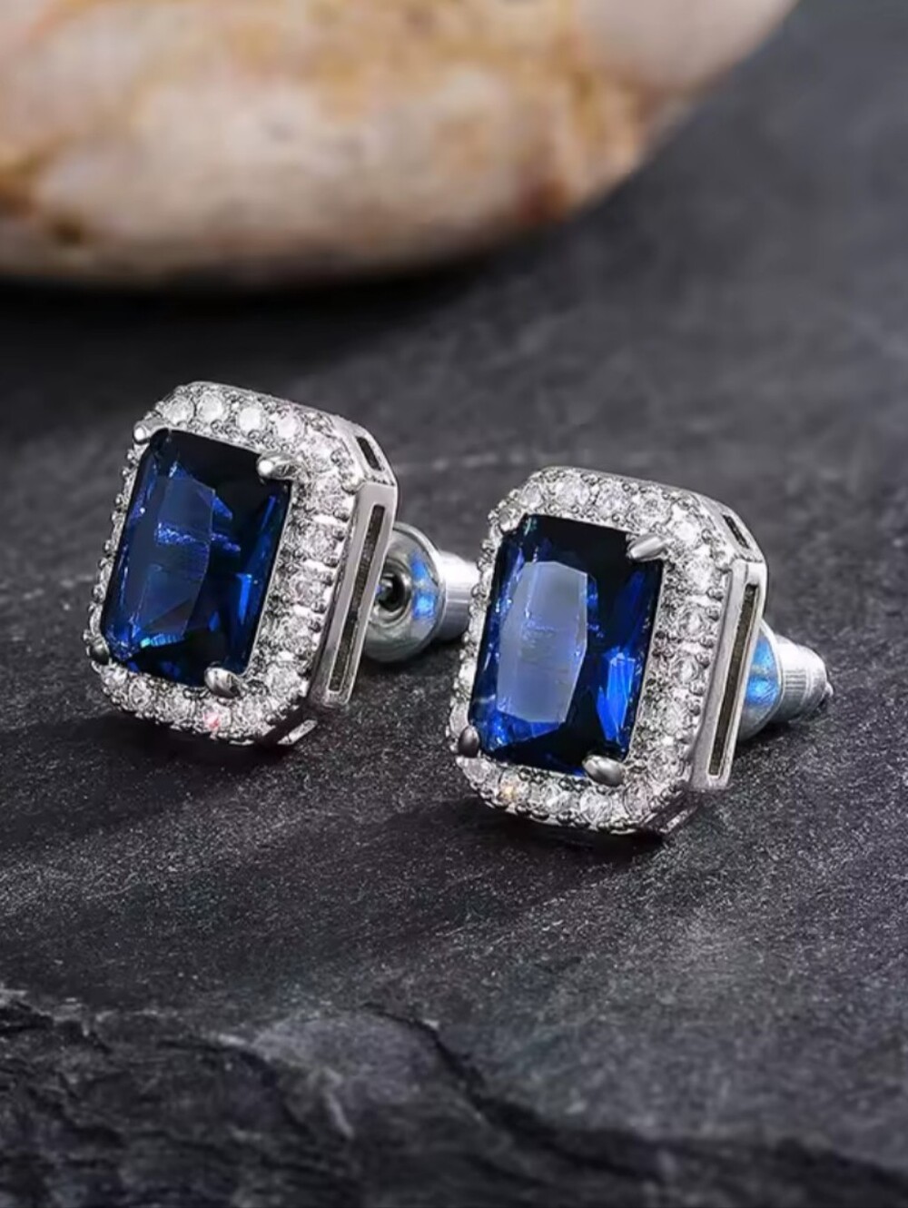 White Rhodium Blue Emerald Cut Halo Stud Earrings